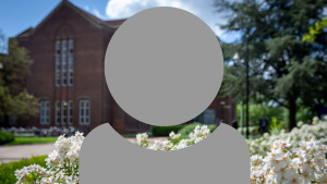 A grey person icon showing just head and shoulders with a side view of Highfield Hartley library background.