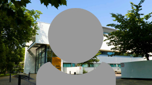 A grey person icon showing just head and shoulders with a WSA University building in the background.