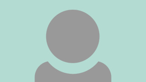 A grey person icon showing just head and shoulders with a pale green/blue background.