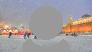 A grey person icon showing just head and shoulders with a winter snowy scene of the red square in Moscow background.